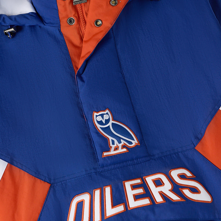 Edmonton Oilers October's Very Own OVO x Starter Blue Half-Zip Hooded Jacket